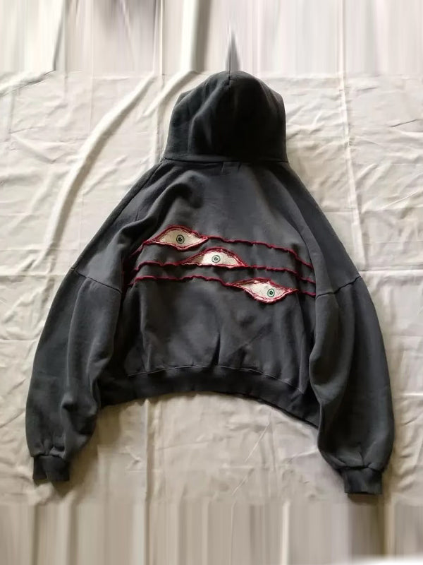 Stylische Oversized Hoodie mit lustigen Augen - IdealeKleiden