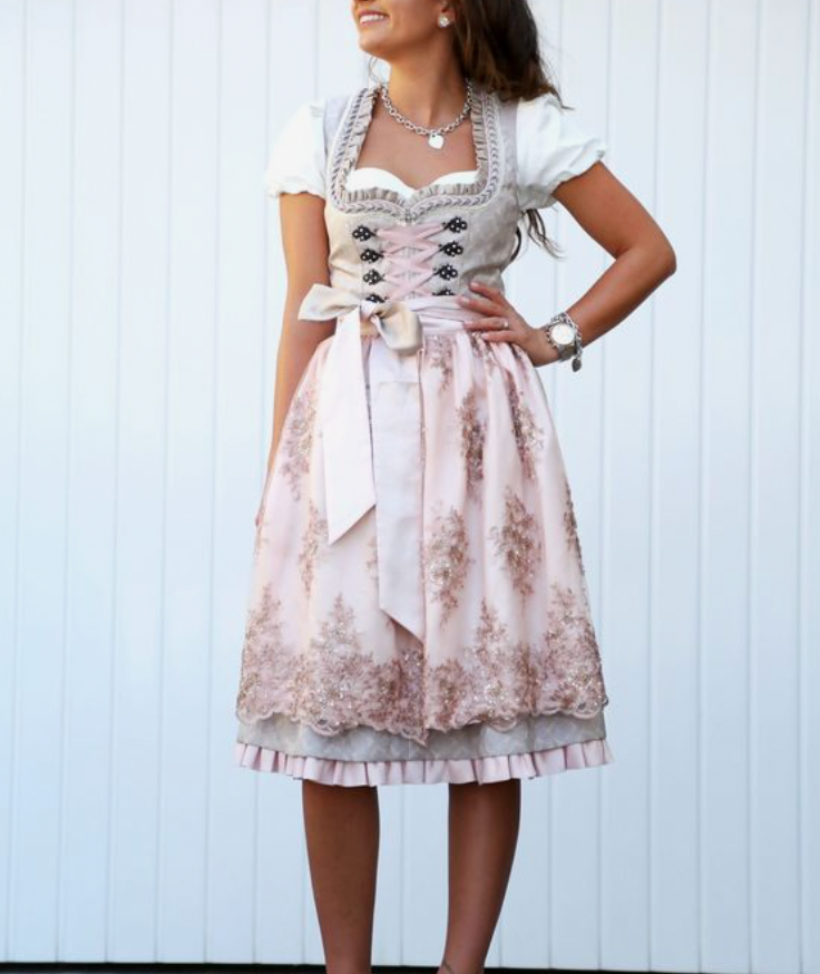 Traditionelles Dirndl Kleid mit Schürze und Bluse