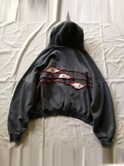 Stylische Oversized Hoodie mit lustigen Augen - IdealeKleiden