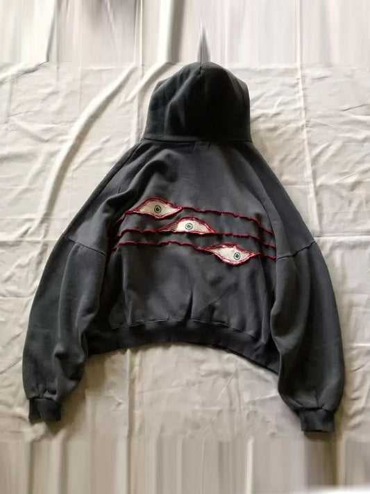 Stylische Oversized Hoodie mit lustigen Augen - IdealeKleiden