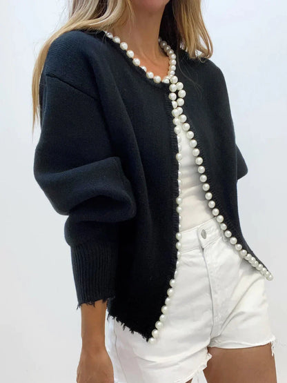 Elegantes Kleid mit Perlen und Rippensaum