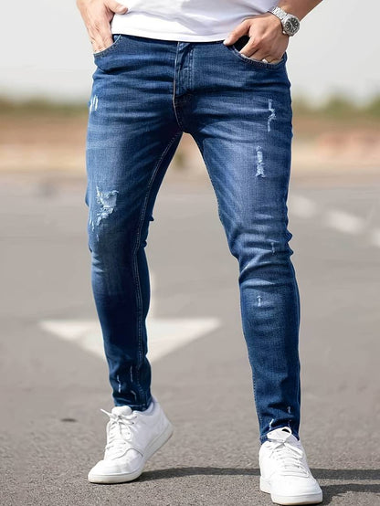 Schmale Herrenjeans Blau Zerrissen