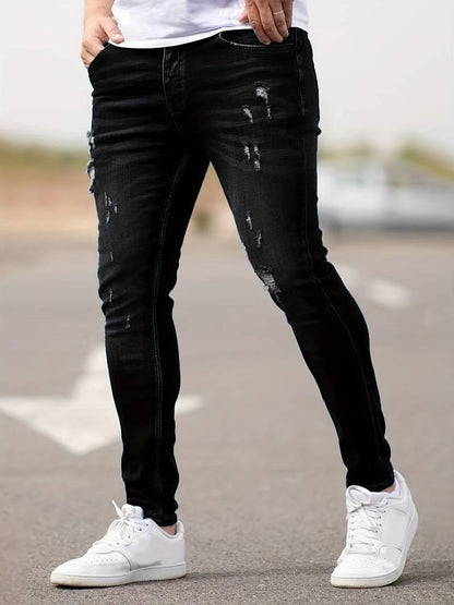 Schmale Herrenjeans Blau Zerrissen
